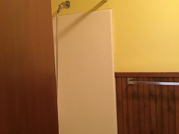 Bathroom with full tub and shower
