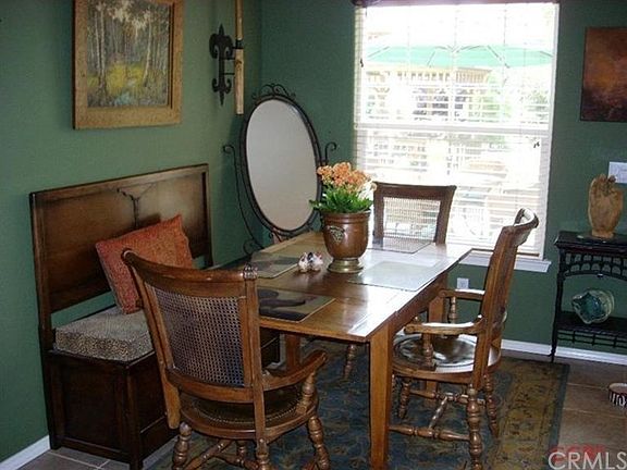 This cozy dinette is close to the kitchen, family, and patio.