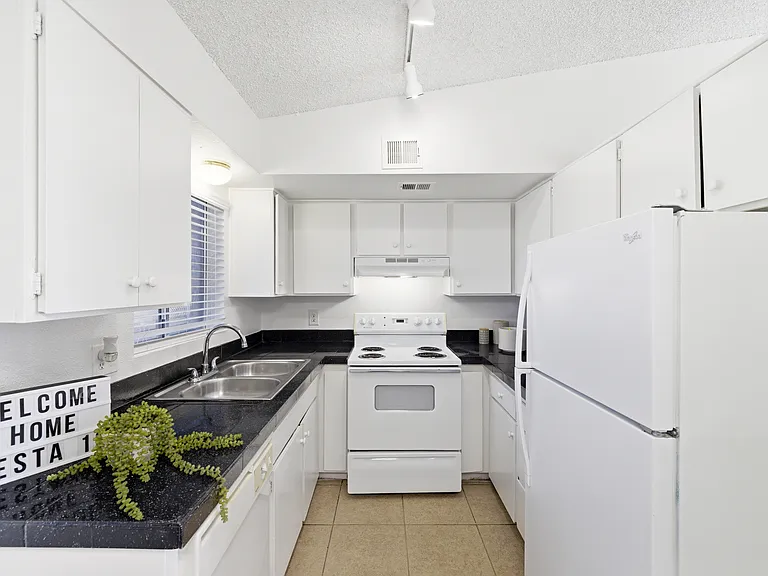 Complete kitchen appliance package, including a dishwasher, range and refrigerator.