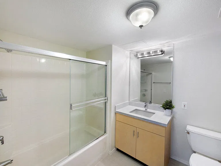 Modern bathrooms with glass-enclosed showers