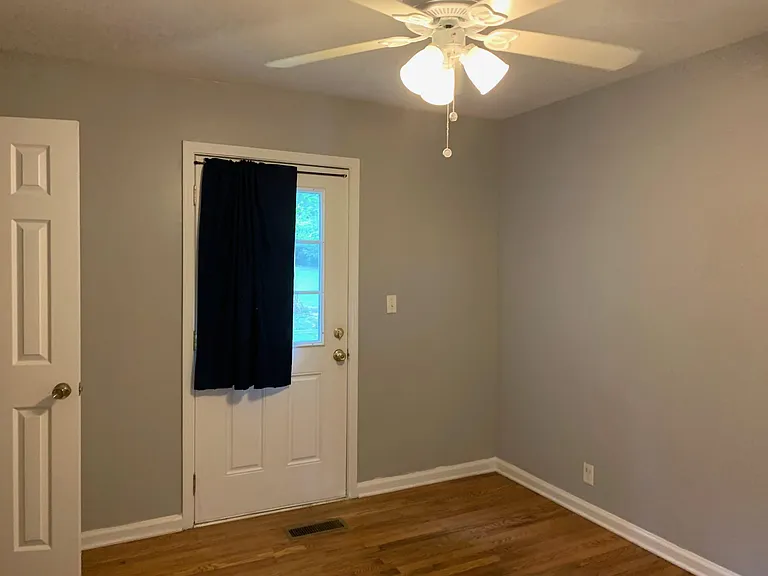 Bedroom 3 with door to the outside deck.