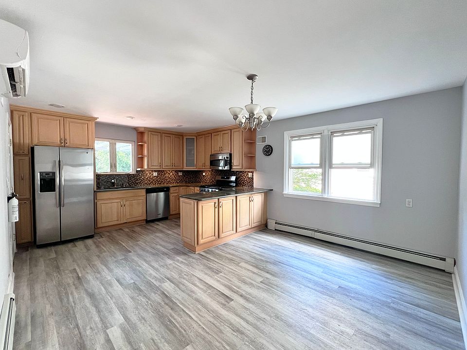 Modern eat-in and entertainment kitchen, stainless steel appliances