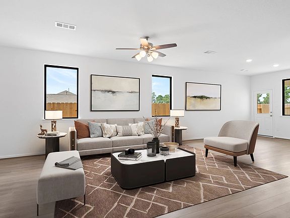 Your family room has ample space to entertain family and friends. This space features beautiful floo