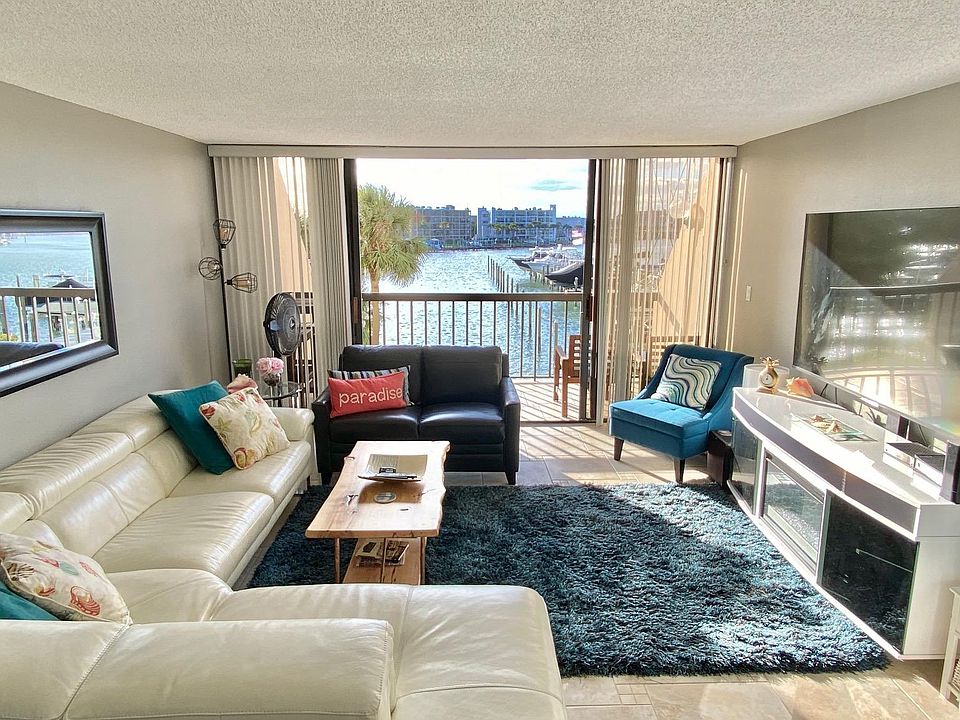 Large modern full furnished 2 bedroom/2 bath condo with water/marina views