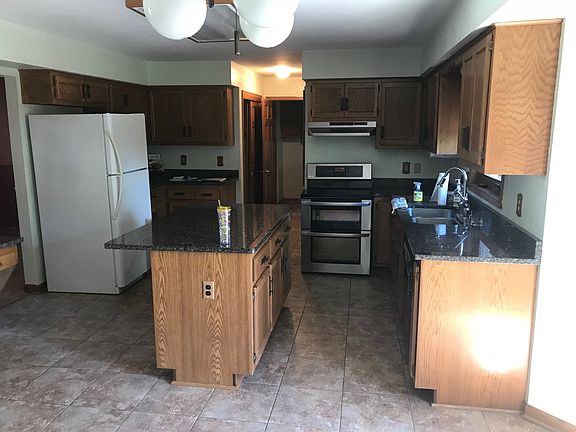 Kitchen with Oak/Granite.