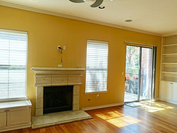 Living area with fireplace and open concept.