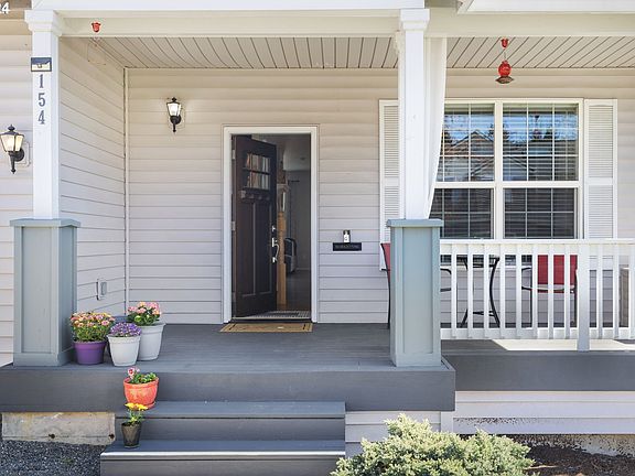 2nd image of 154 NE Woodsong St
