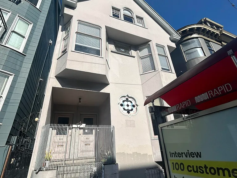 flat is on the second level with the two bay windows pictured