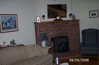 Living room w/fireplace/wood stove 