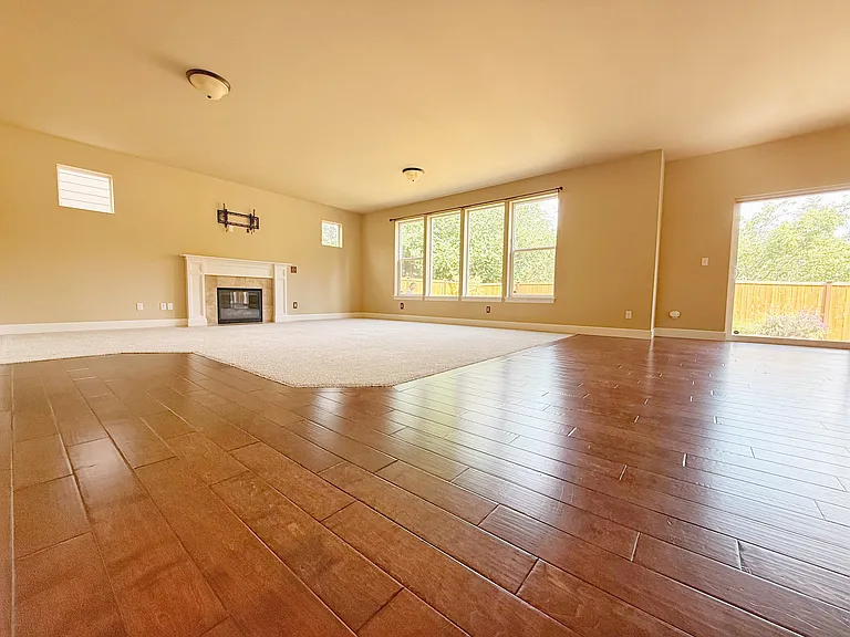 Open living room and back slider.