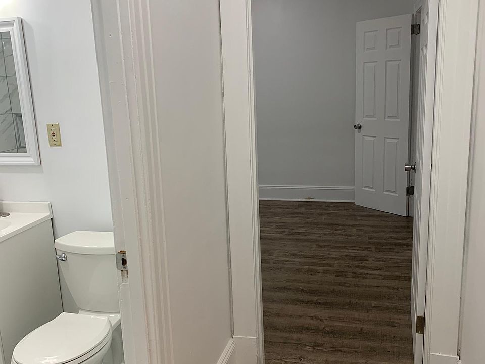 Hallway between bedrooms and bathroom.