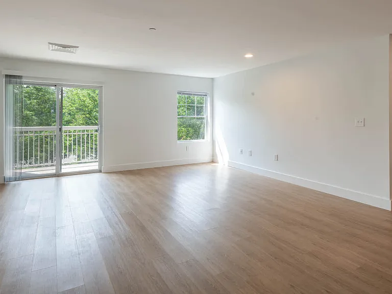 Living Room with Balcony and Hard Surface Flooring