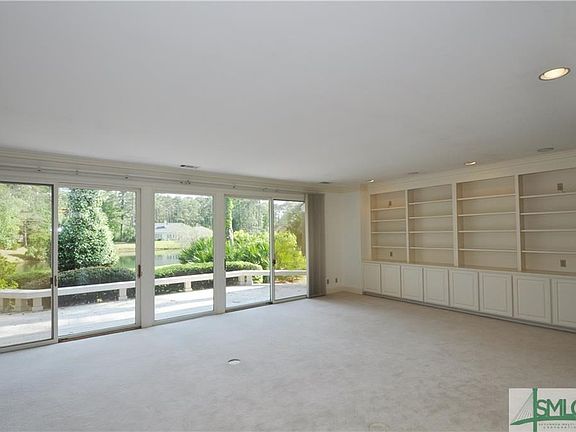 Living Room has lagoon views and built-ins