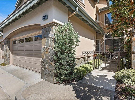 Lovely and private entrance of home leading to front porch.