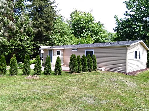 Back of the home is your own private oasis.