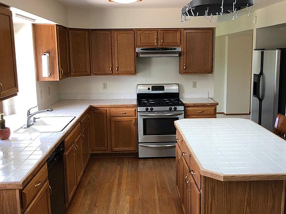 Ample kitchen storage and window to backyard