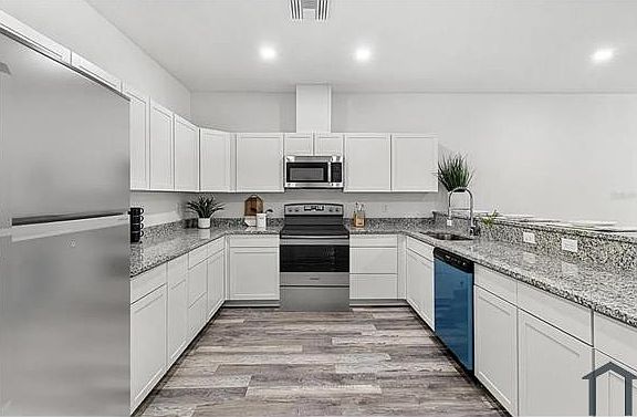 2nd image of 447 45th St E #447
