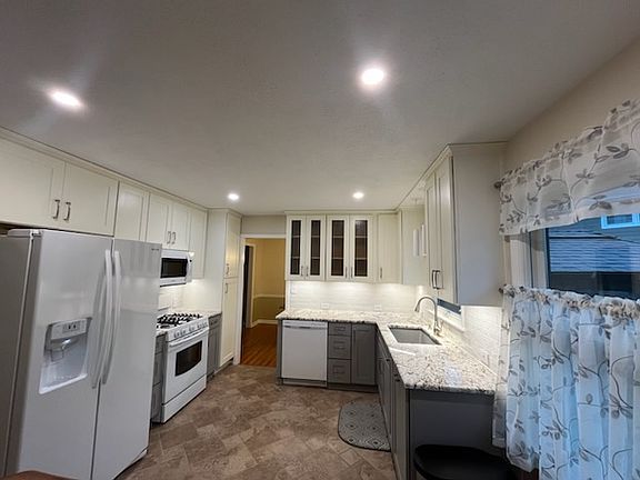NEW Kitchen - cabinets, lighting sink, faucet, very quiet disposal, in kitchen breakfast nook.