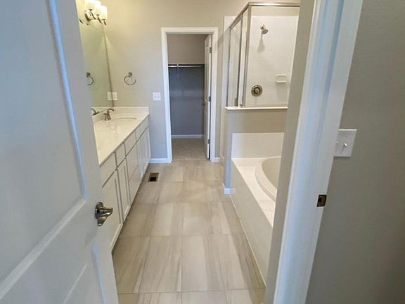 Gorgeous master bathroom with separate tub and shower!
