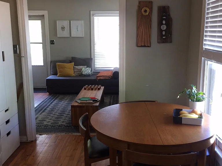 View from kitchen through dining into living room.