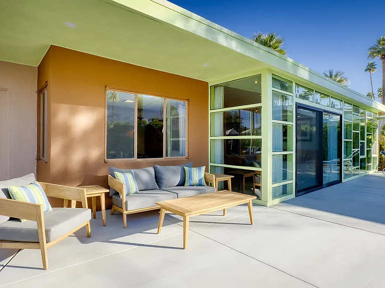 Shaded outdoor conversation area.
