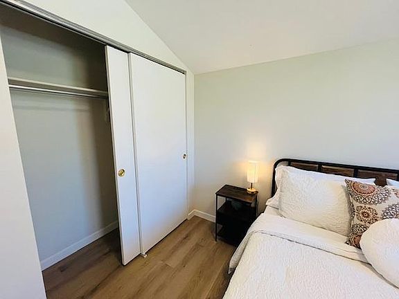 Full closet with shelving and hangers provided