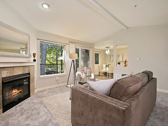 Open flowing floor plan, and living room with picture windows.