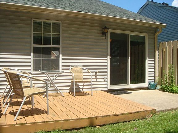 This home has both a patio and deck with fencing for privacy.