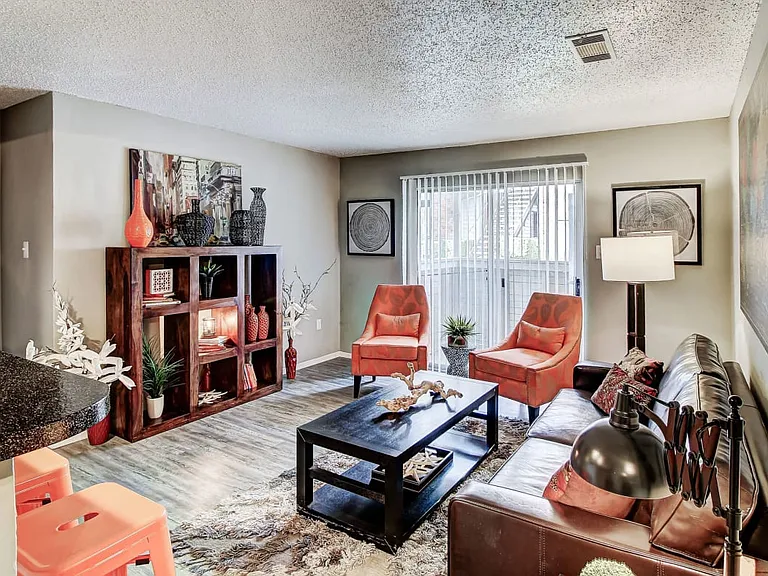 Living Room with lots of natural light and hardwood style floors