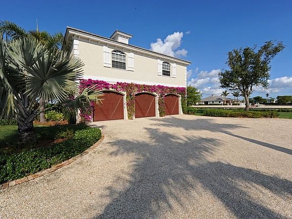 3 car garage & guest quarters