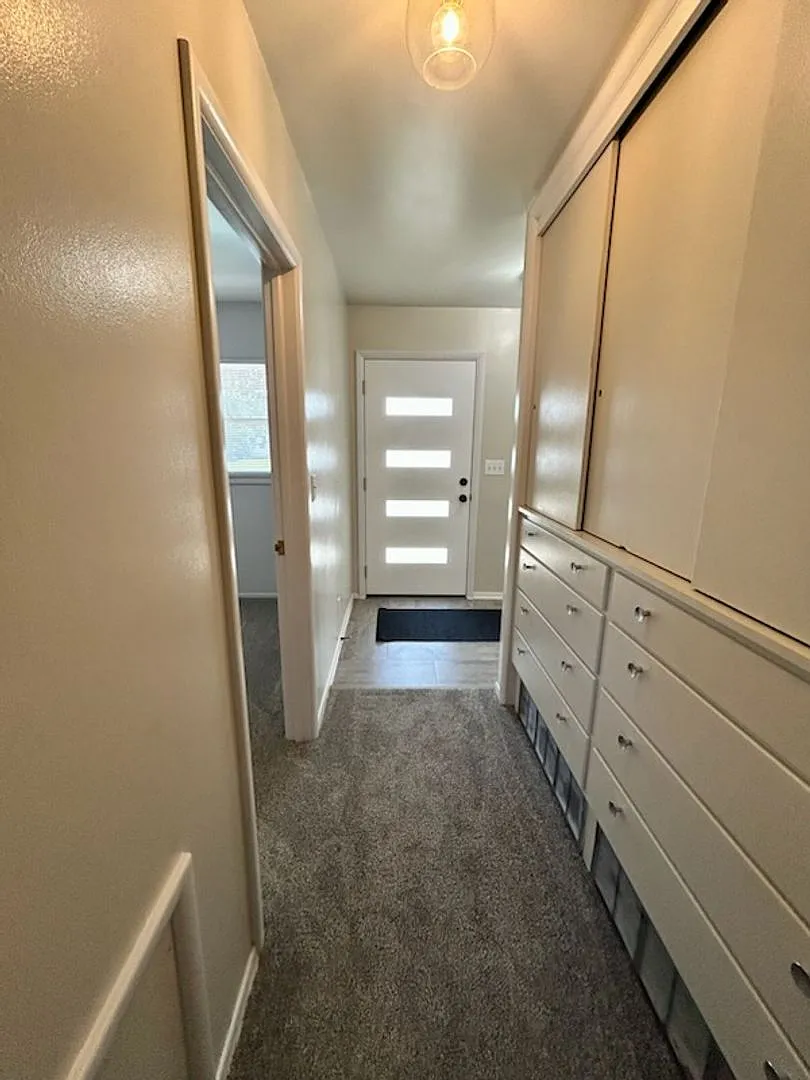 Spacious 3-Bedroom Duplex with Private Yard, Garage & Bonus Living Space! — Photo 3