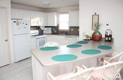 Kitchen
						:
						Upgraded kitchen with seating for 6. Open floor plan to Grand Room.