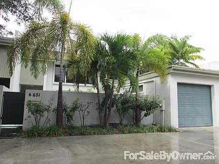 front view of townhouse with attached garage