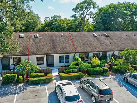 Rarely on the market Villa in Pine Ridge Courtyard entry parking at your front door!
