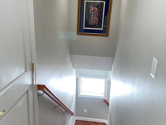 Carriage house stairway (up/down).