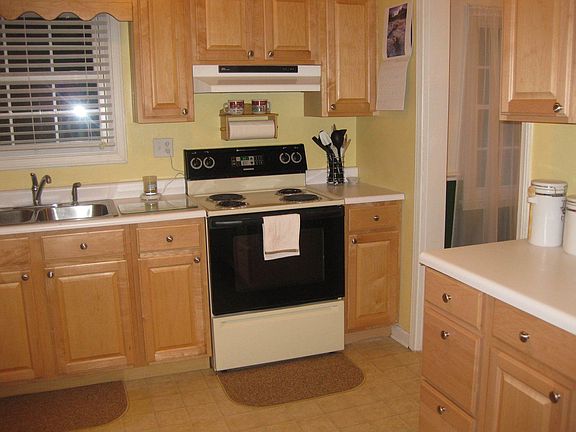 Bright, sunny kitchen. Appliances convey