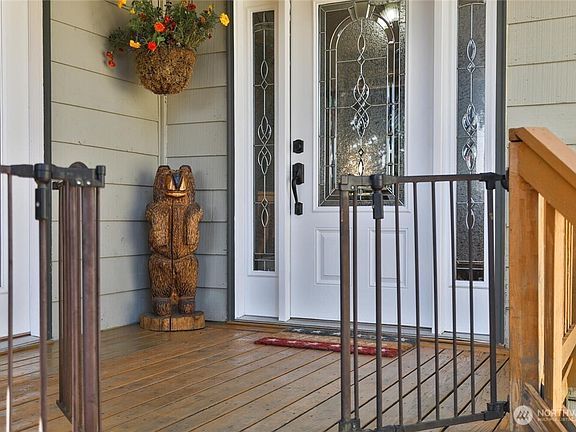 Enjoy a welcoming entrance that offers privacy and convenience with separate access to both primary suites.">