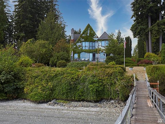 From Dock Looking Back to Home; Two Tax Parcels = 1.09 Acres. Space For You & Yours To Make New Memories.