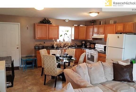 Wide open Kitchen with door access to back yard