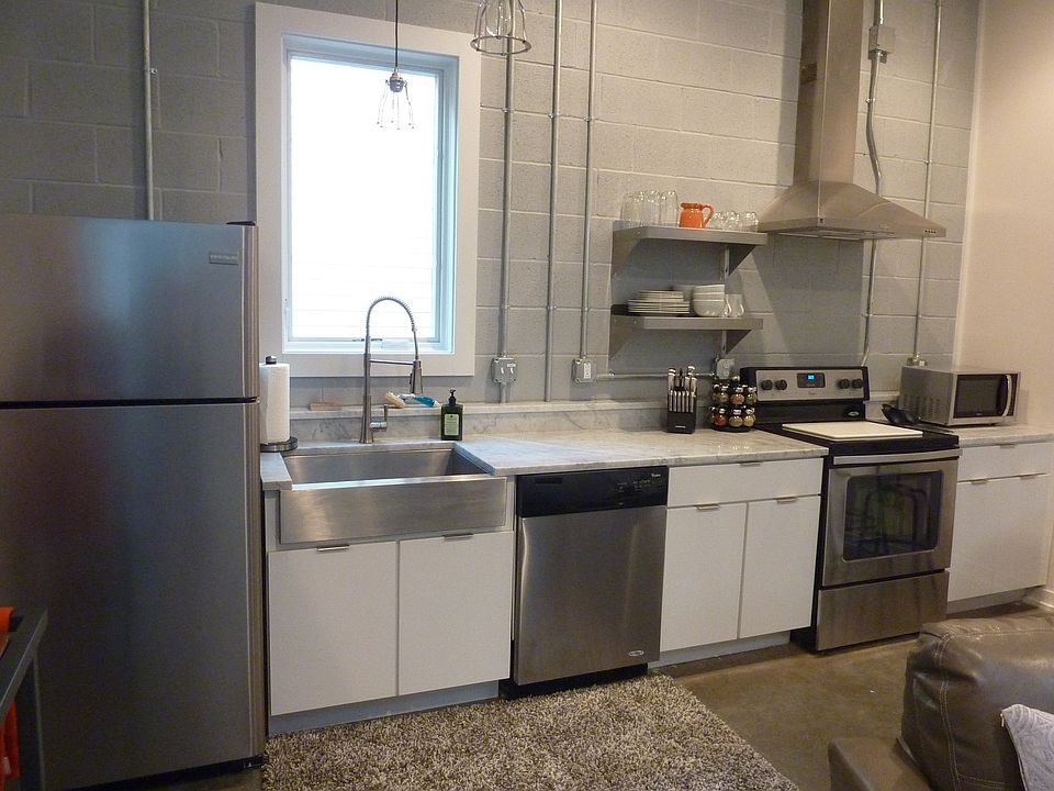 Kitchen - all new stainless appliances and marble counters