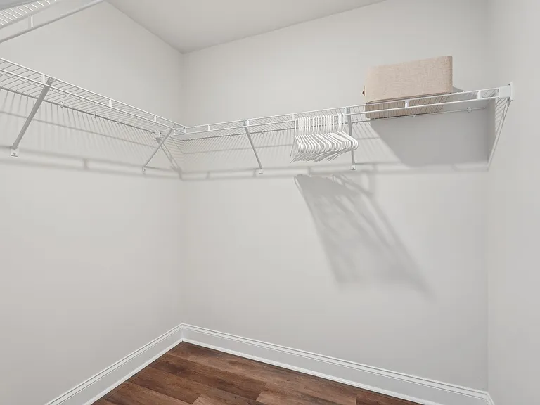Full size walk in closet in the primary suite.