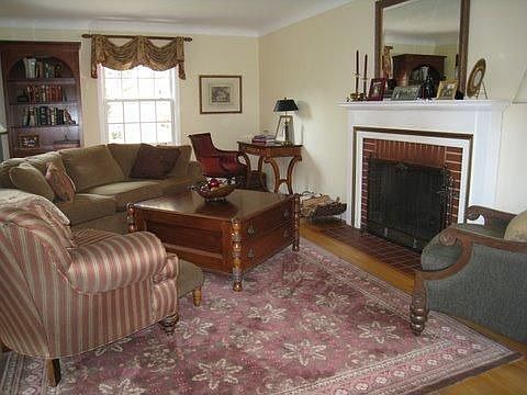 Living room with wood burning Fireplace
