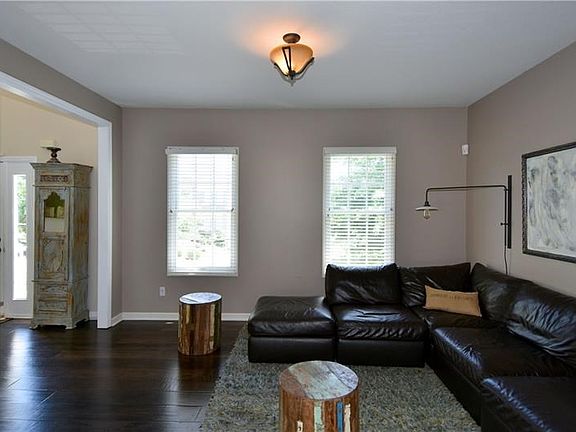 Living Room - New lighting throughout, open to the entry.