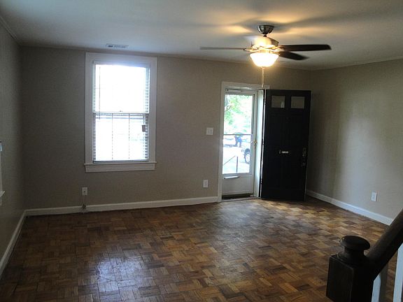 Large living room unfurnished.