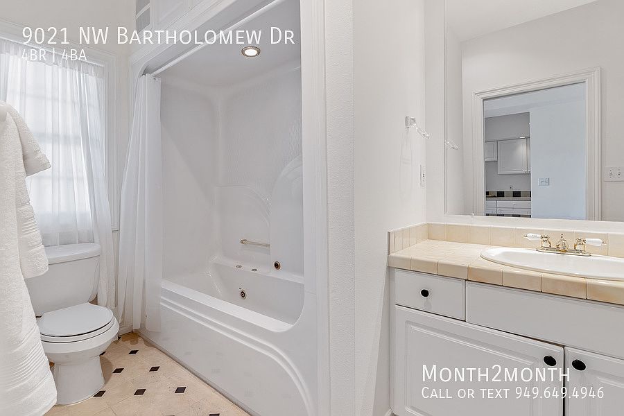 1st image of 9021 NW Bartholomew Dr