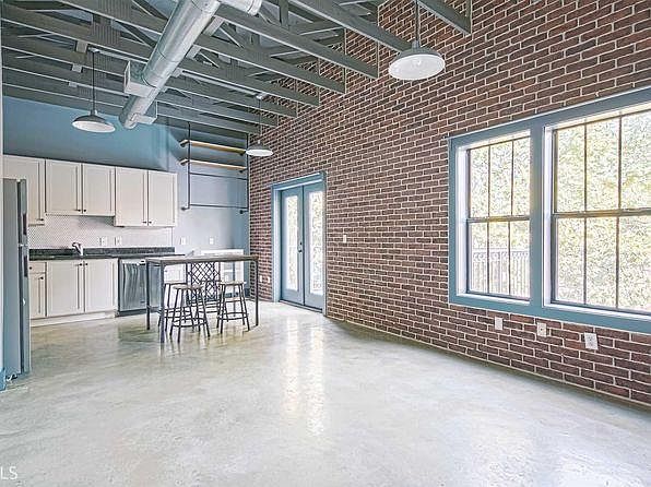 Open floor plan living space and kitchen