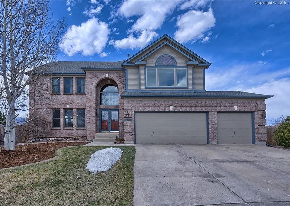 Stunning 2-story brick home on a cul-de-sac in Summerfield with spectacular view