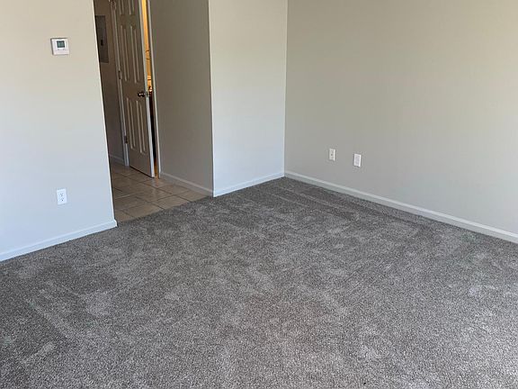 Living room looking into kitchen
