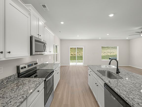 The kitchen comes with stainless steel appliances