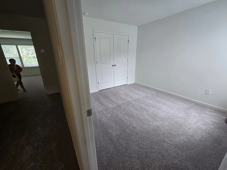 2nd bedroom with window overlooking the front of the house